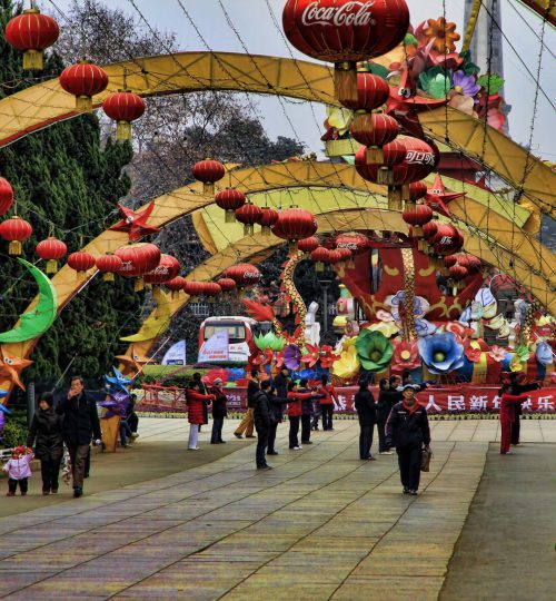 Colorful lantern festival with crowds and decorations in Changsha, Hunan.